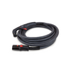 Coiled, black plasma cutting torch with cable connection port.